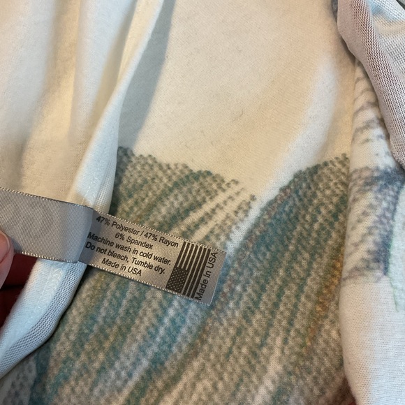 An asymmetrical hem lends a chic vibe to this soft and cozy pullover. - Picture 5 of 6